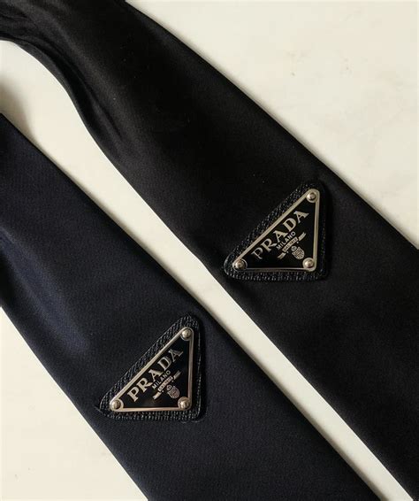 prada tie clip.